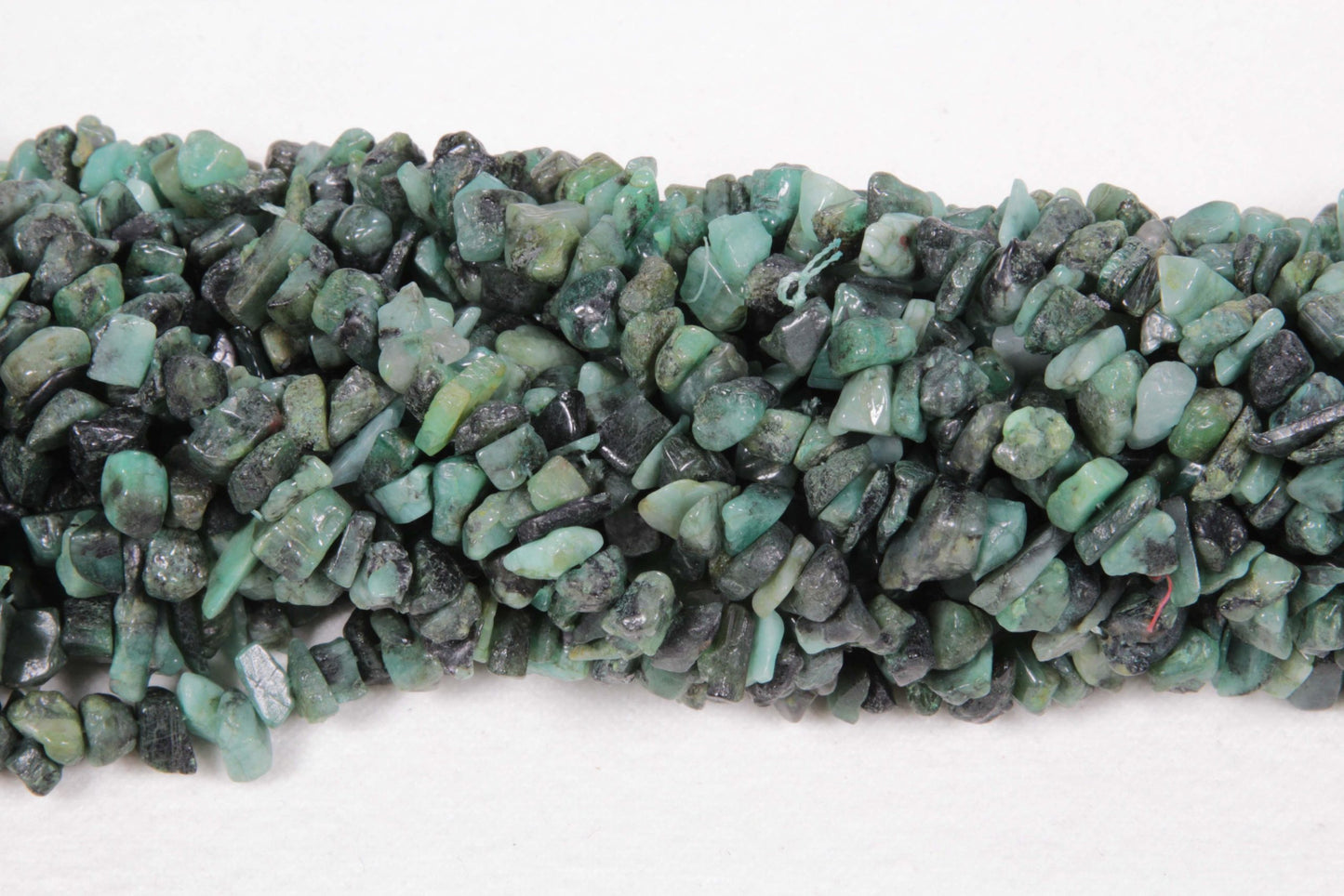 36 inch Natural Emerald Med. Plain Chip Beads